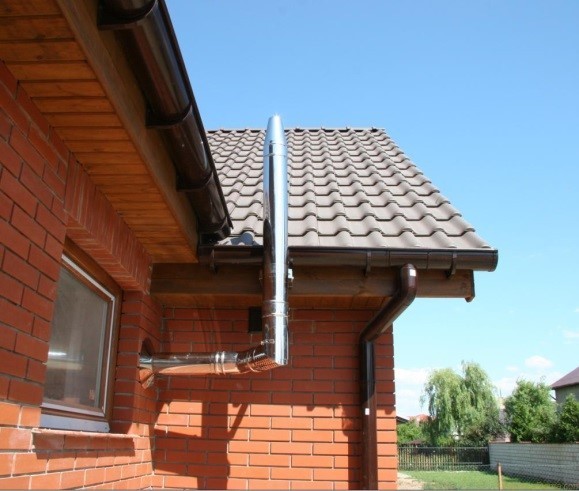 Система дымохода с усиленной тягой, за счет подсоса воздуха через соединительное колено