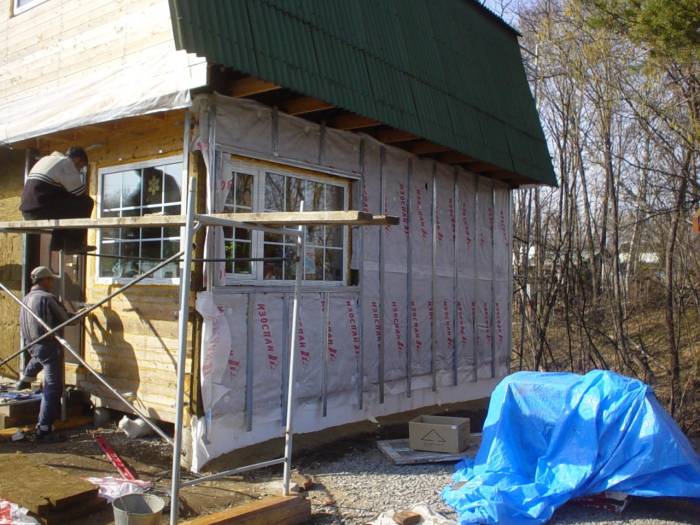 Утепление фасада деревянного дома